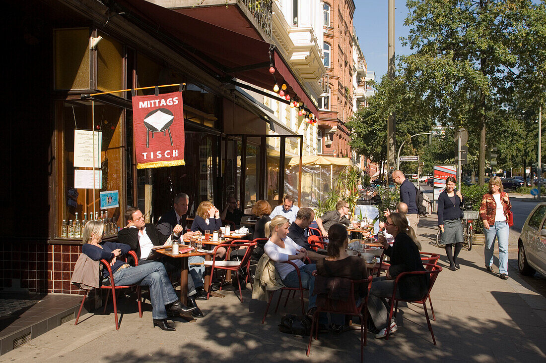 People sitting outside of Cafe Gnosa at St. Georg street, Hamburg, Germany