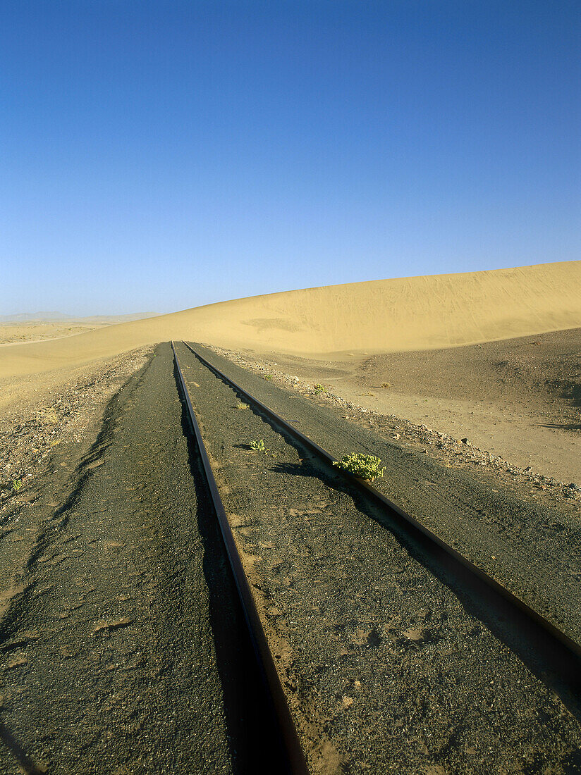 Railway tracks in front of sanddune, Namibia, Africa