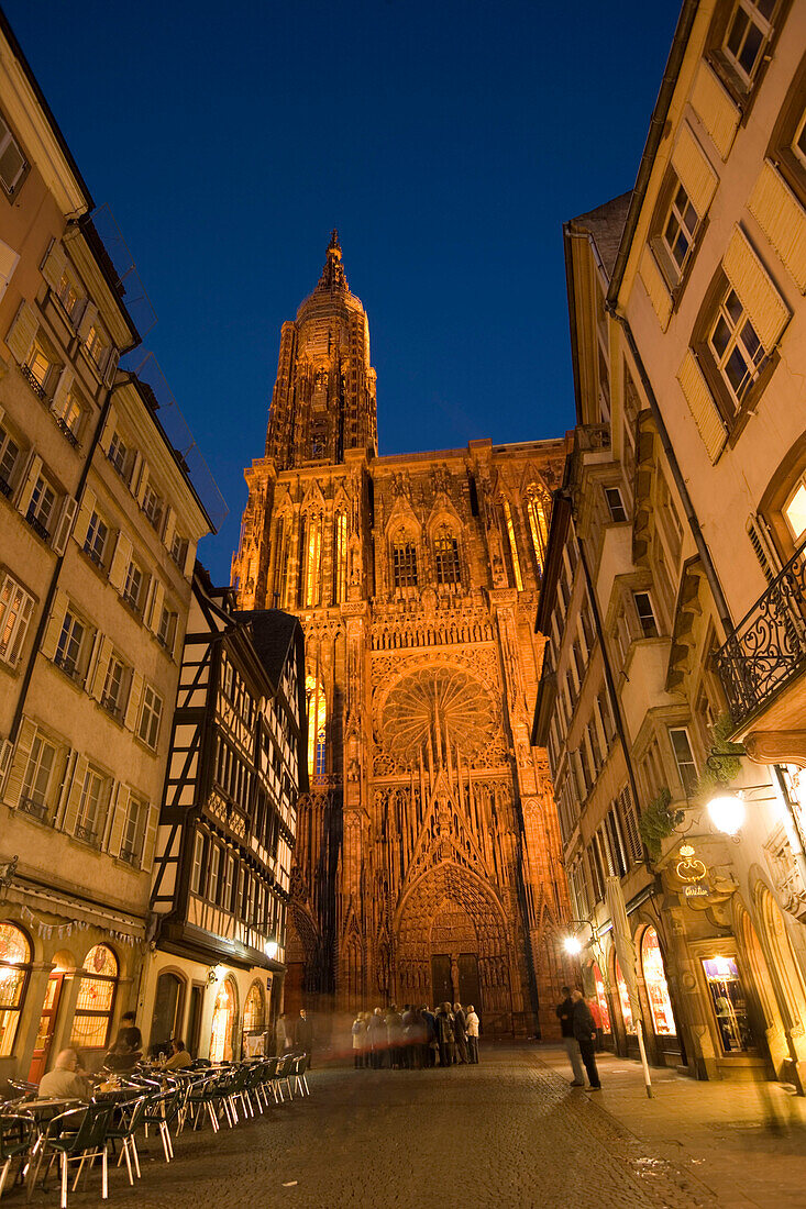 View through the Rue Merciere to the Our Lady's Cathedral, View through the Rue Merciere with a pavement cafe to the western facade of the Our Lady's Cathedral Cathedrale Notre-Dame, , Rue Merciere, Strasbourg, Alsace, France