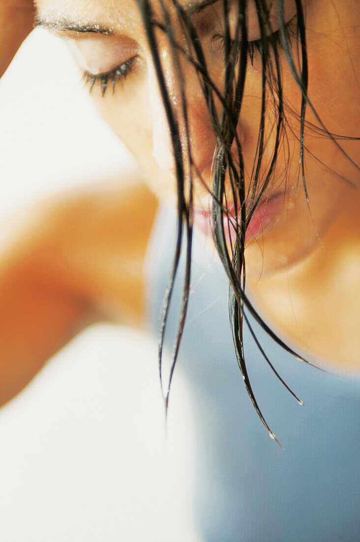 Young woman with wet hairs