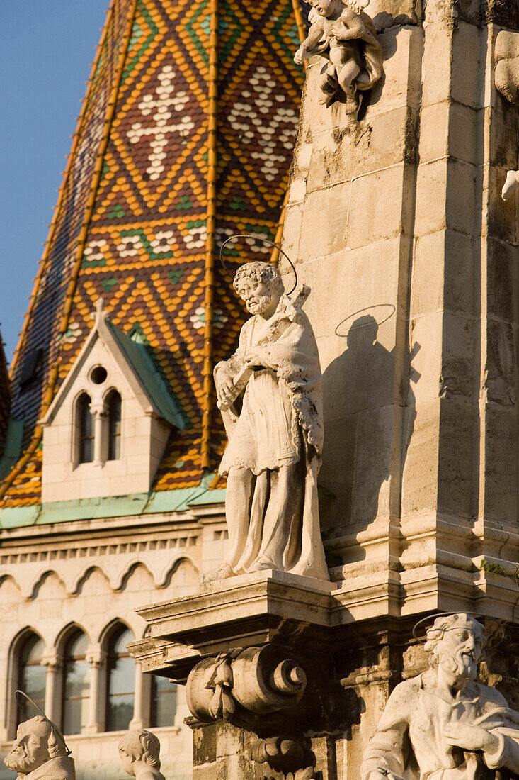 Part of the Statue of the Holy Trinity and Matthias Church on Castle Hill, Buda, Budapest, Hungary