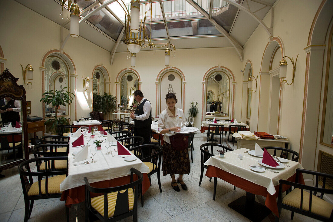 Staff covering the tables, Staff covering the tables in a restaurant, Buda, Budapest, Hungary