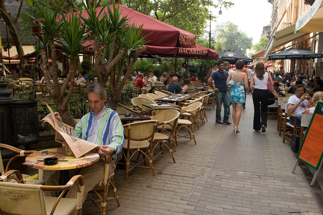 People in open-air cafes, People sitting in open-air cafes at Liszt Square, Pest, Budapest, Hungary
