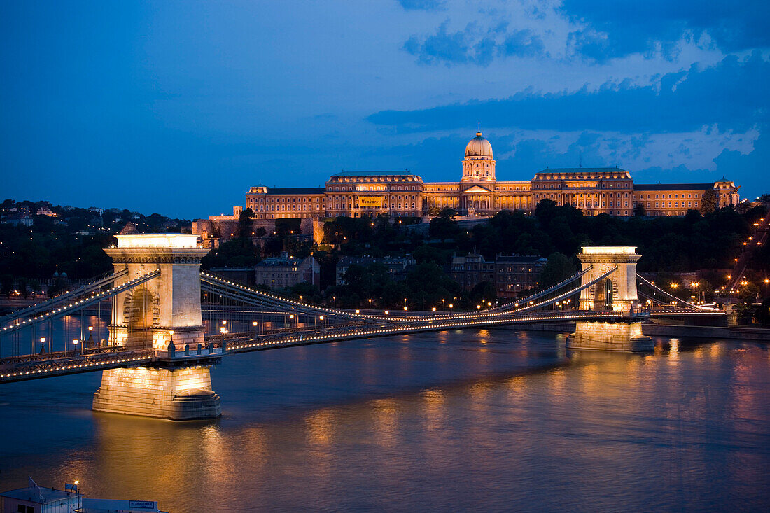 Danube, Szechenyi Chain Bridge and Royal Palace, View over Danube with Szechenyi Chain Bridge to illuminated Royal Palace on Castle Hill, Buda, Budapest, Hungary