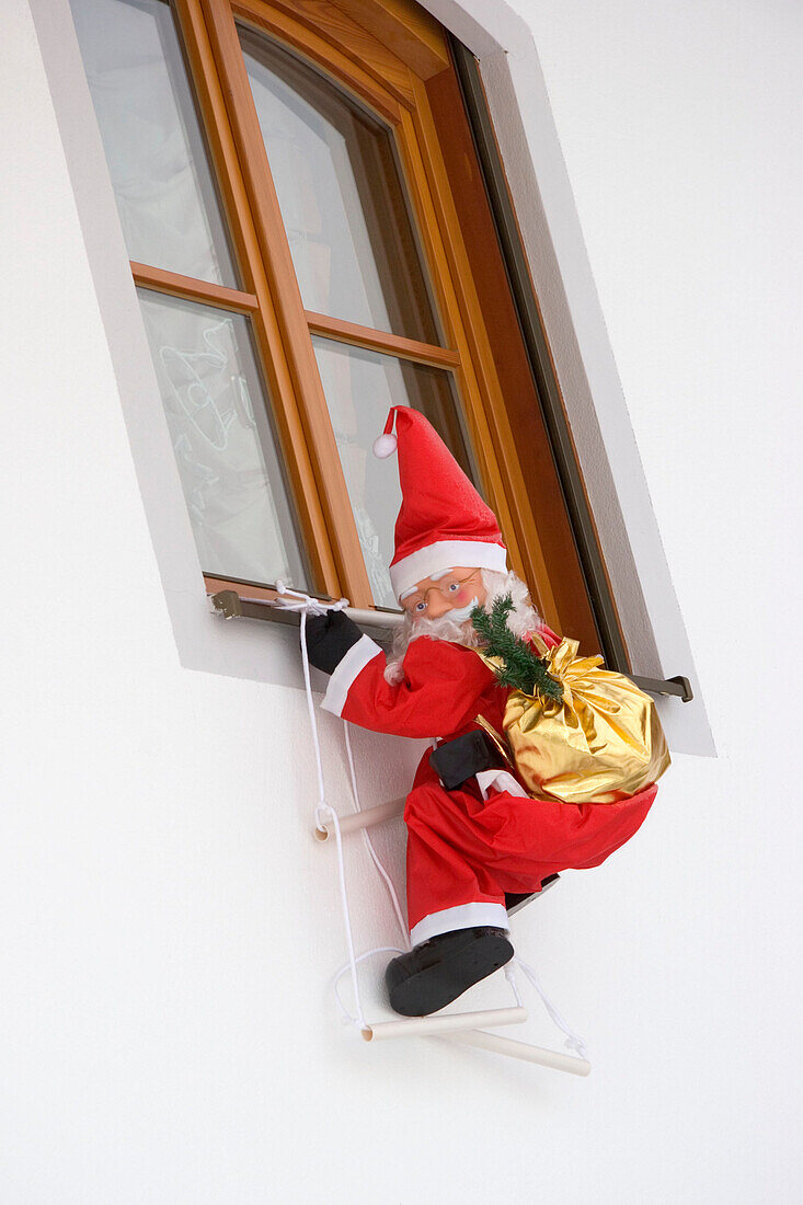 Santa claus figure on window, Bavaria, Germany