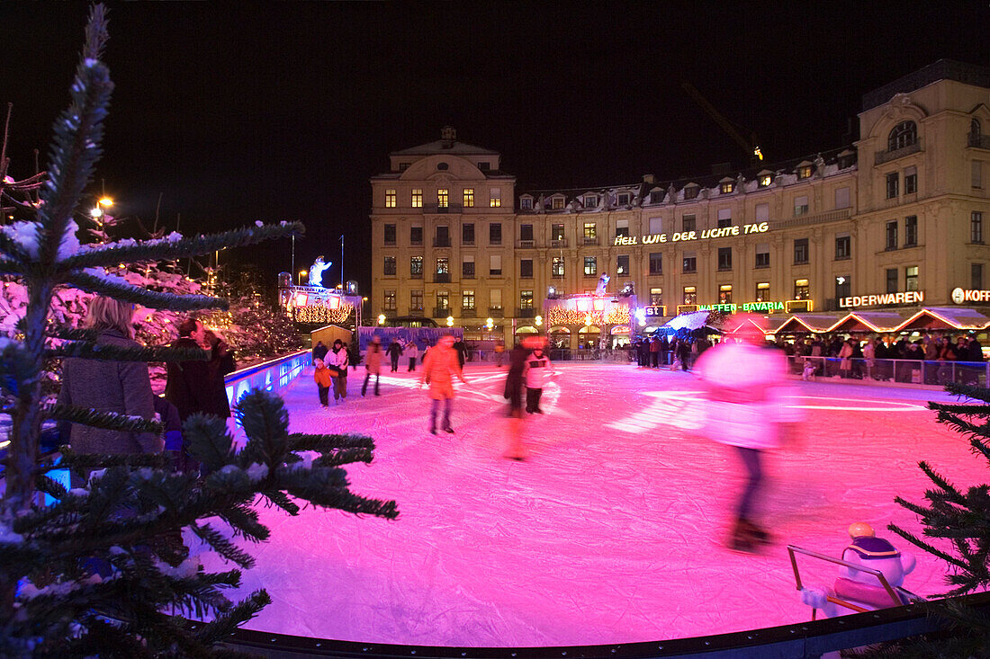 Winter attraction, ice rink at Karlsplatz, Stachus, Munich, Bavaria, Germany