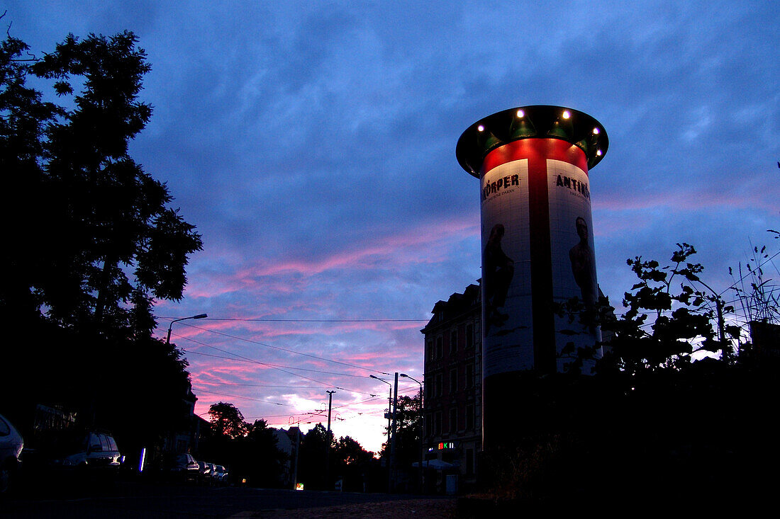 Advertising column under clouded sky, Connewitz district, Leipzig, Saxony, Germany, Europe