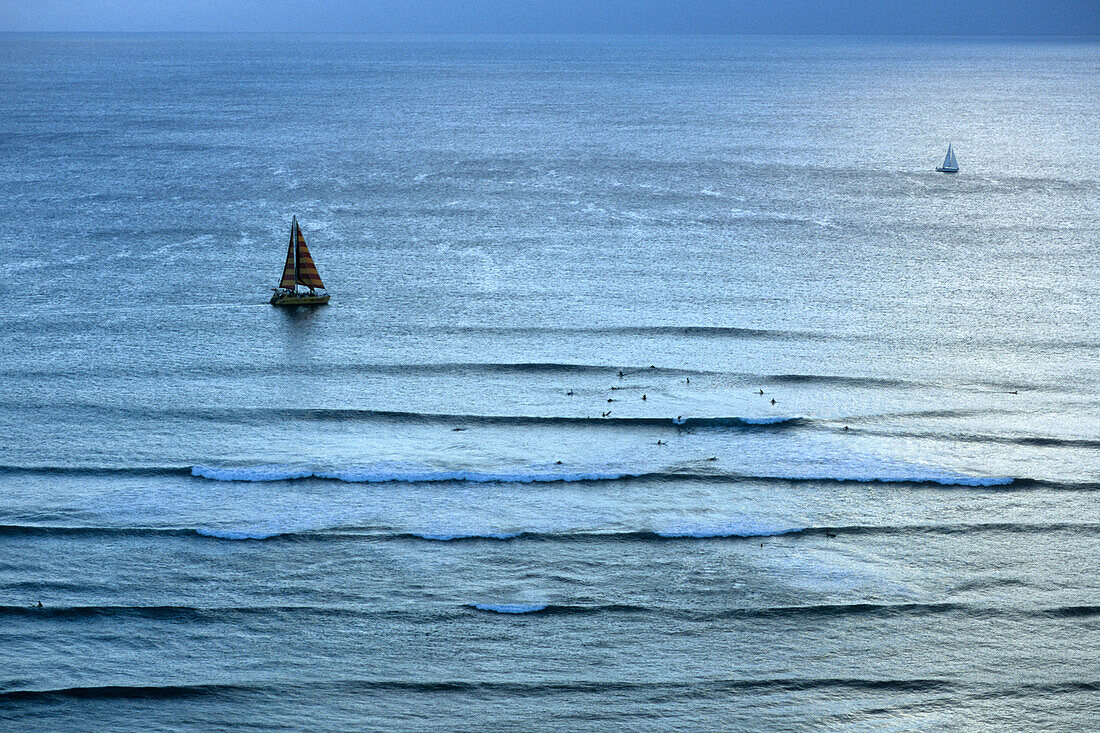 Catamaran & Surfers, Waikiki Beach, Honolulu, Oahu, Hawaii, USA