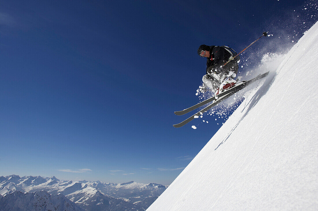 Male skier jumping, Nebelhorn, Oberstdorf, Upper Bavaria, Germany