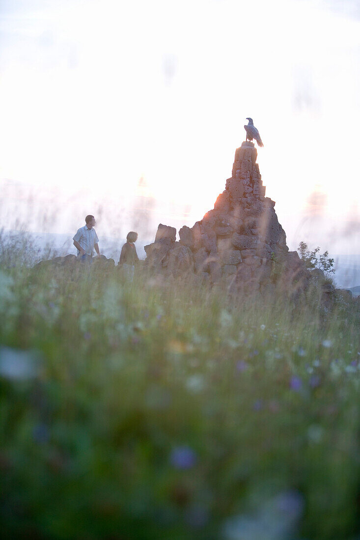 Hikers at the Aviator Monument, Wasserkuppe Mountain, Rhoen, Hesse, Germany