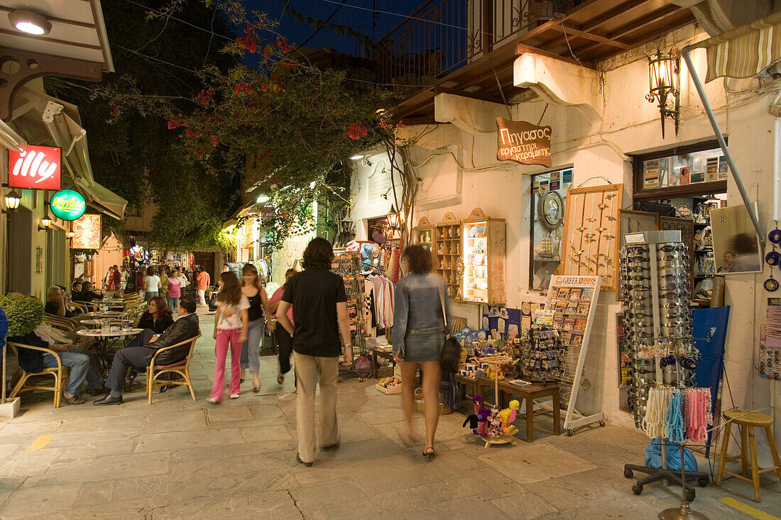 People strolling over shopping street Odos Ifestou with souvenir shops in the evening, old town, Kos-Town, Kos, Greece