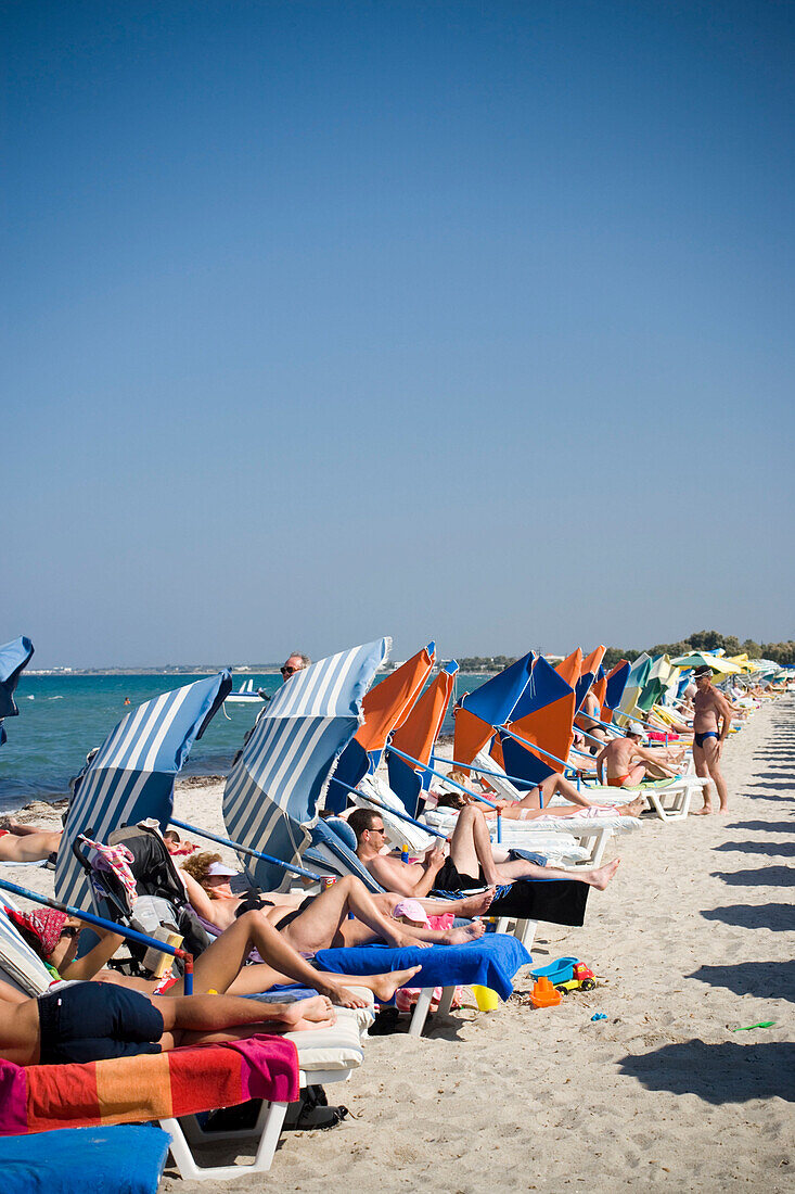 People sunbathing at beach, Tigaki, Kos, Greece