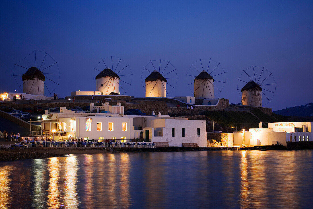 Windmills on a hill in the evening, Little Venice, Mykonos-Town, Mykonos, Greece