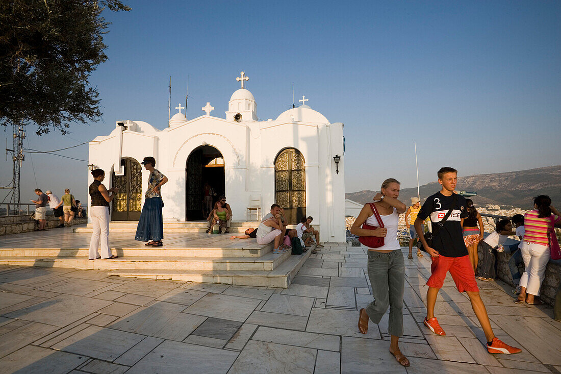 People visiting the Agios Georgios Chapel on the Lykavittos Hill, Athens, Athens-Piraeus, Greece
