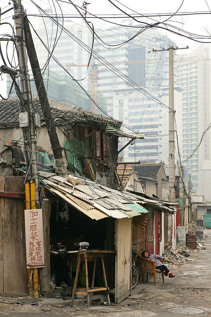 demolition quarter, encroaching new highrise, Shanghai