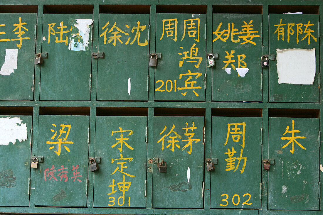 letter boxes in French Concession, green letter box, French, calligraphy