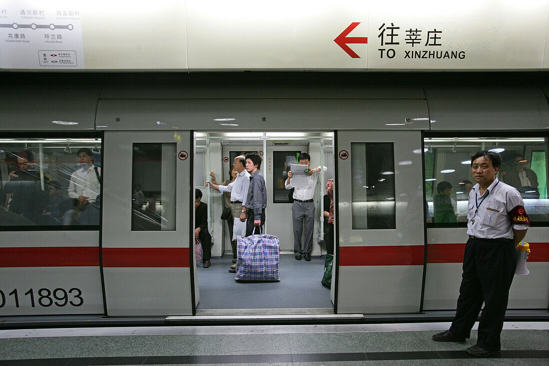Metro Shanghai,mass transportation system, subway, public transport, underground station, Guard, commuters