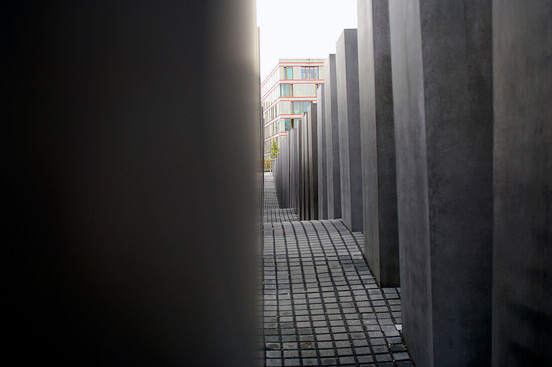 View between the stone cubes of Holocaust Memorial, Berlin, Germany