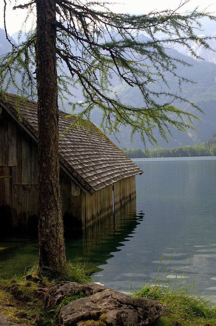 Wooden cabin at lakeshore of Lake Obersee, Berchtesgaden, Bavaria, Germany, Berchtesgaden