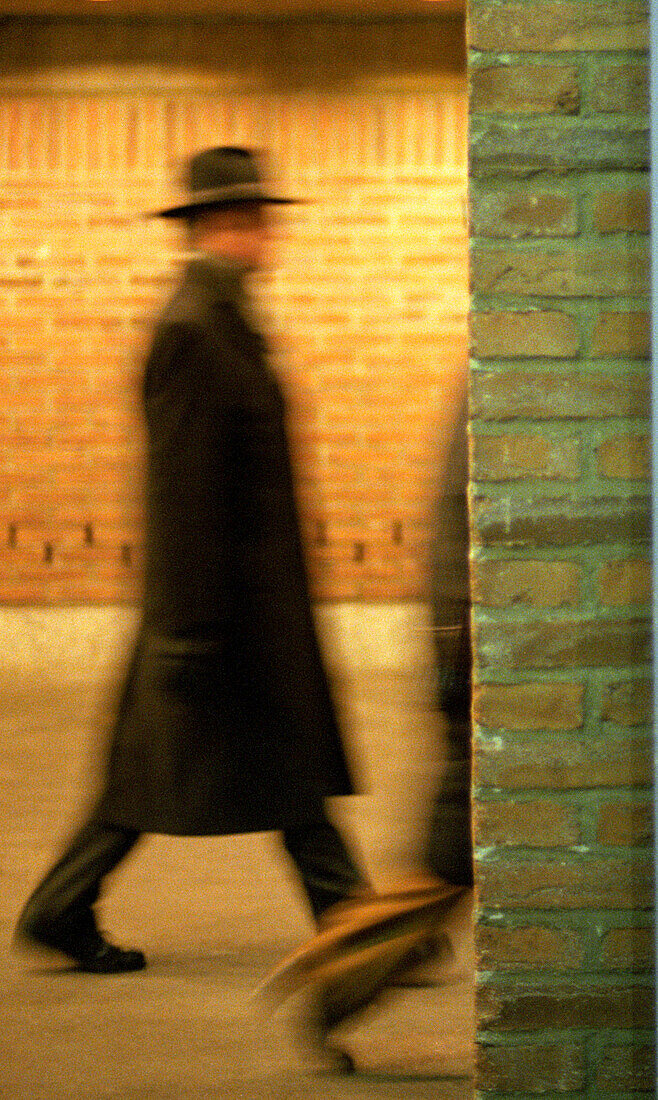 Two people passing by at Gasteig, Munich, Bavaria, Germany, Bavaria, Germany