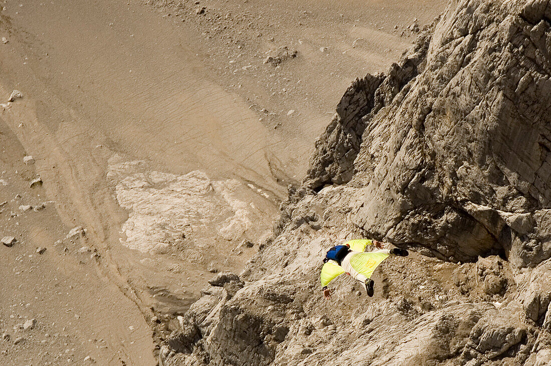 Base jumping from a rock