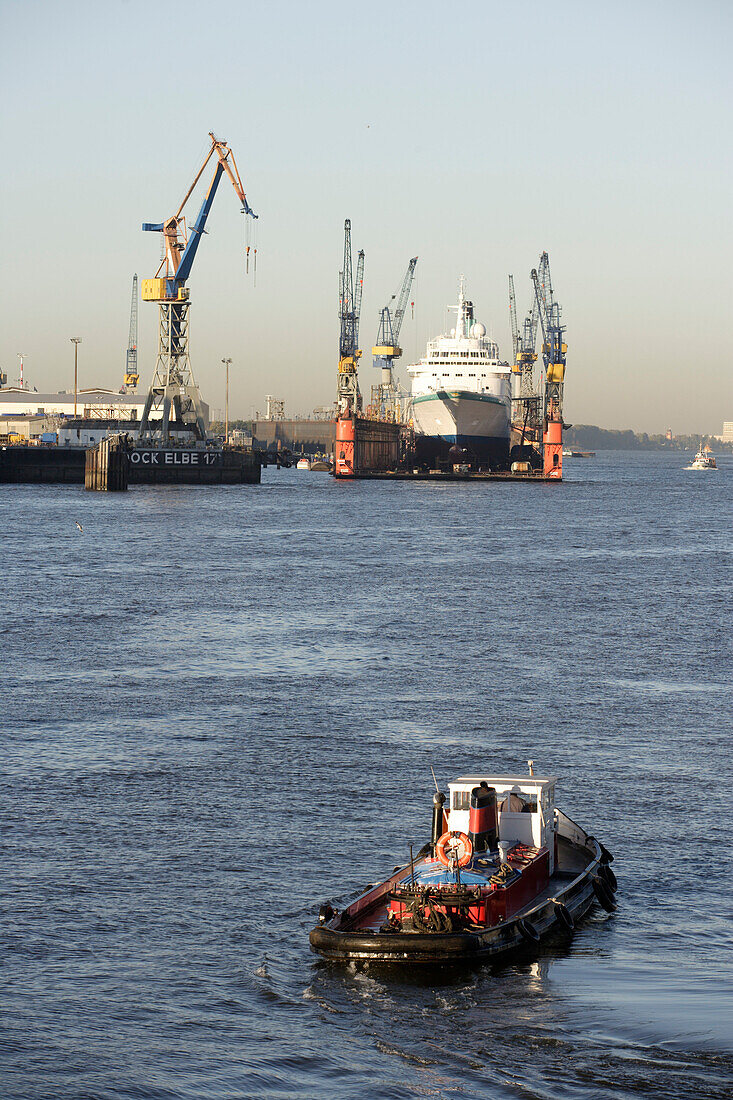 Barge on river Elbe before shipyard, harbor, Hamburg, Germany