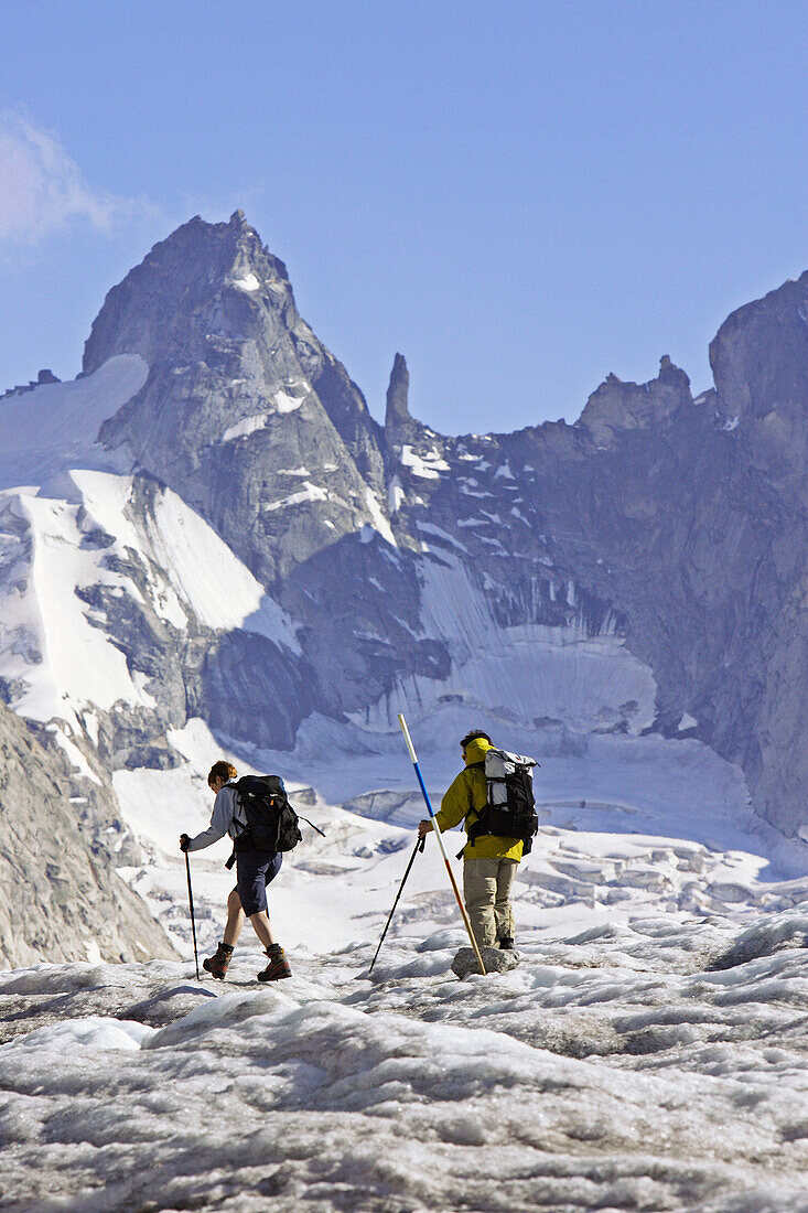 Two women hiking on a glacier, Forno Glacier, Bergell, Graubuenden, Grisons, Switzerland, Alps