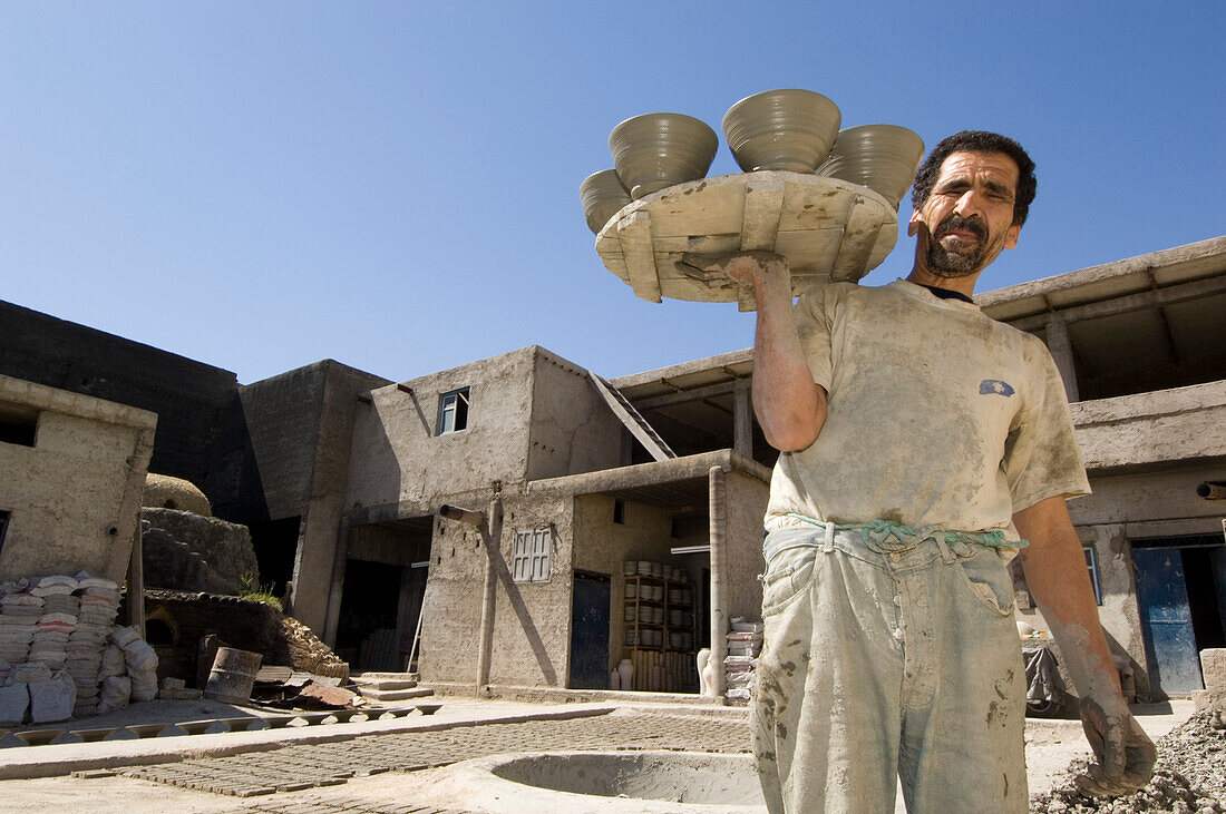 Potter with bowls, Fes, Morocco