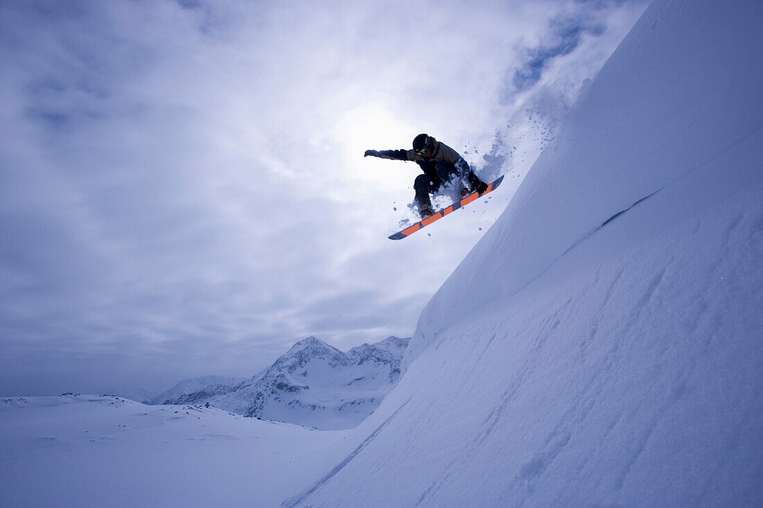 Snowboarding big jump, Kuehtai, Tyrol, Austria