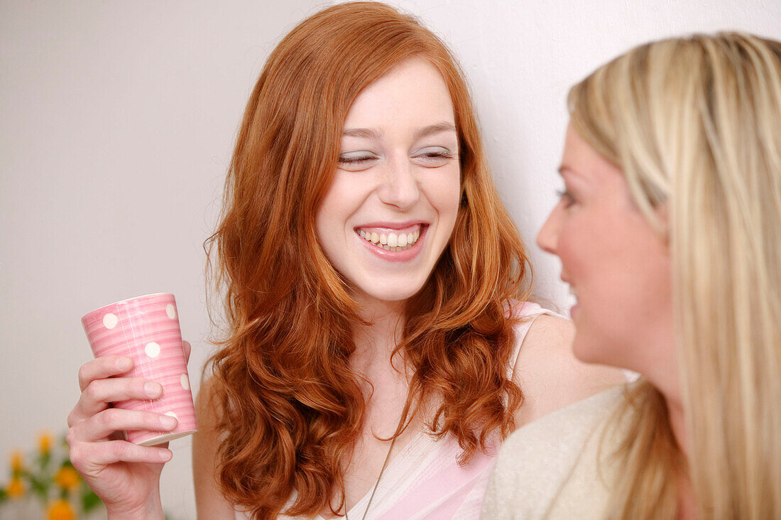 Two friends drinking tea