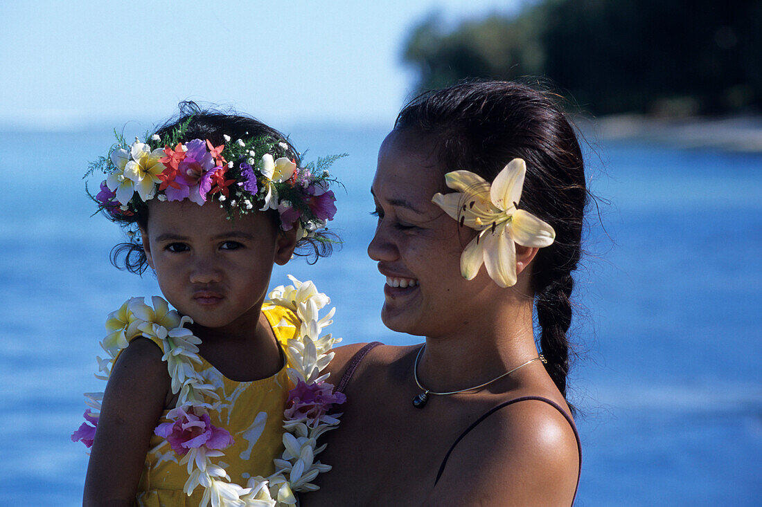 Mother and Daughter with Flowers in Hair,Muri Beach, Rarotonga, Cook Islands