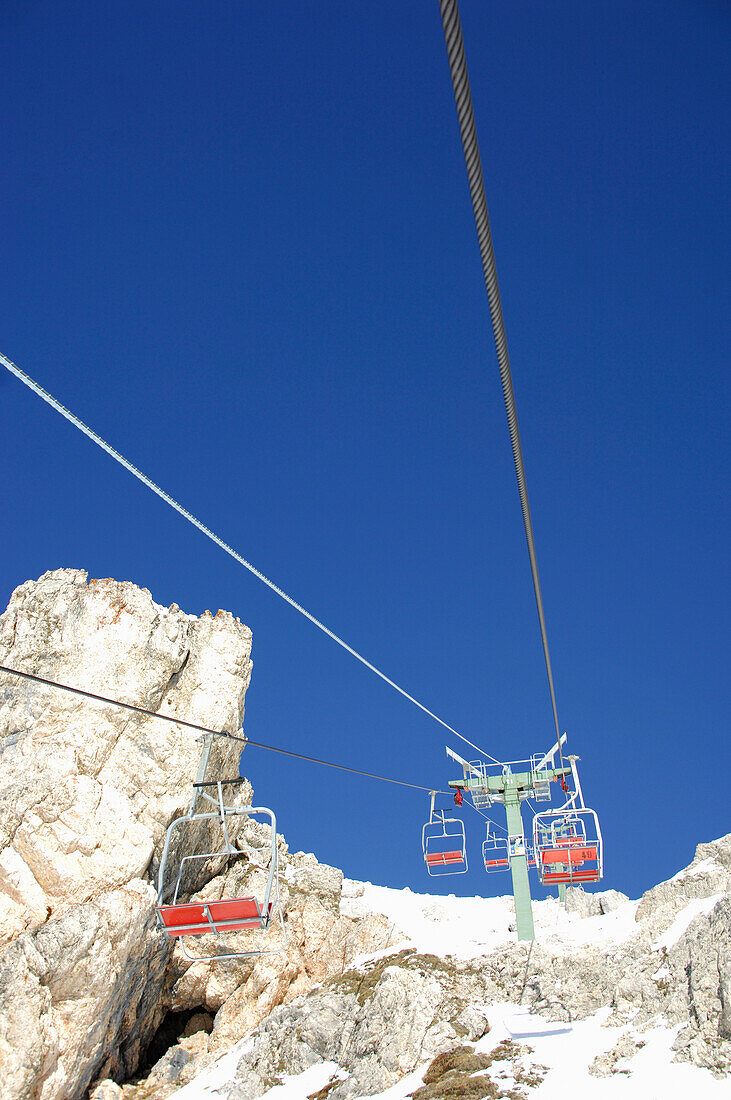 Empty chair lift, Gruppo della Marmolada, Dolomites, Italy