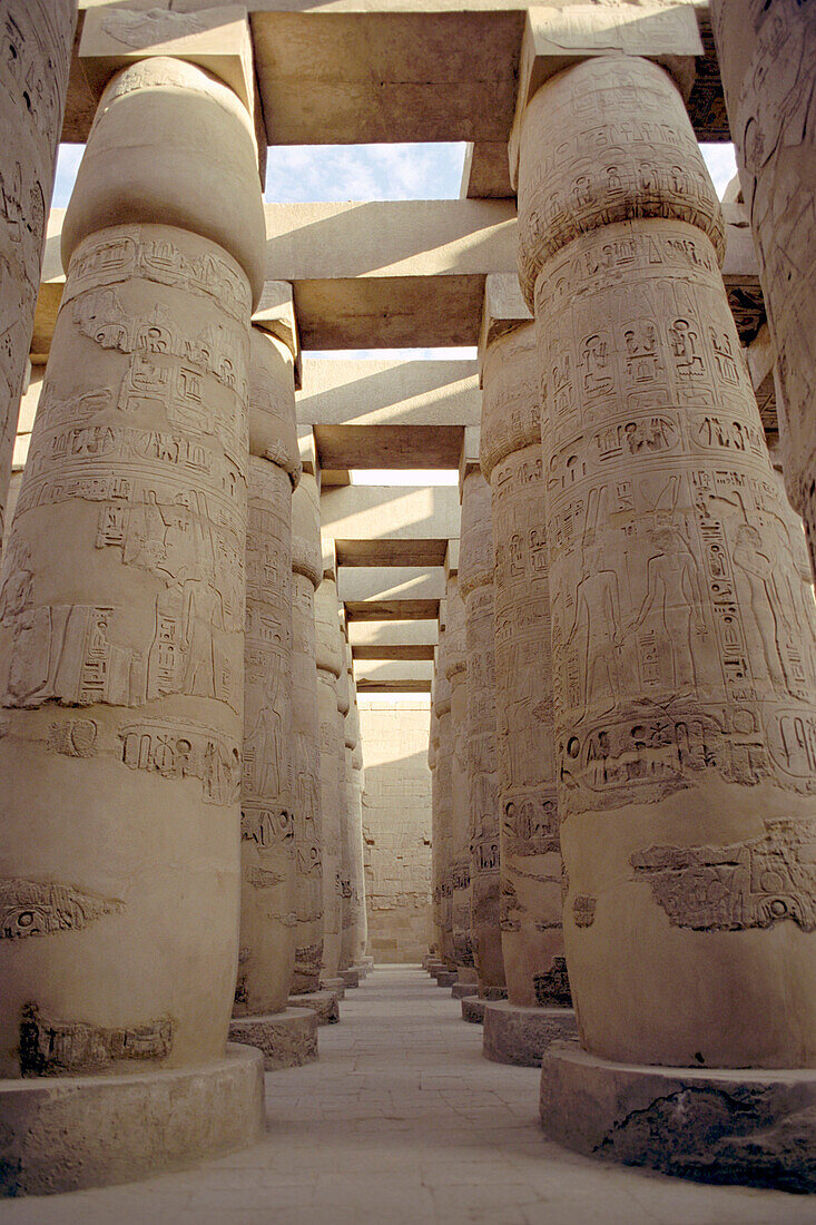 Shady row of columns at the Karnak Temple, Luxor, Egypt