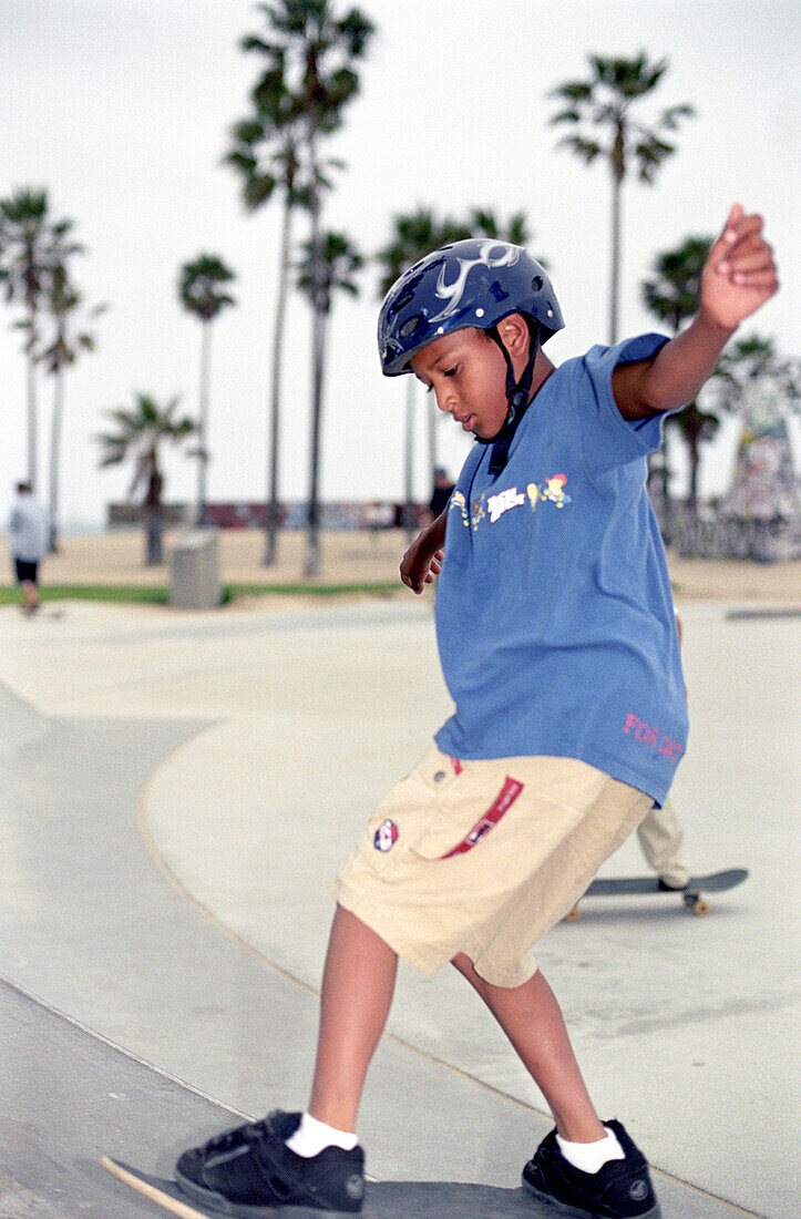 Little boy, skateboarder, venice beach, Los Angeles, California, USA