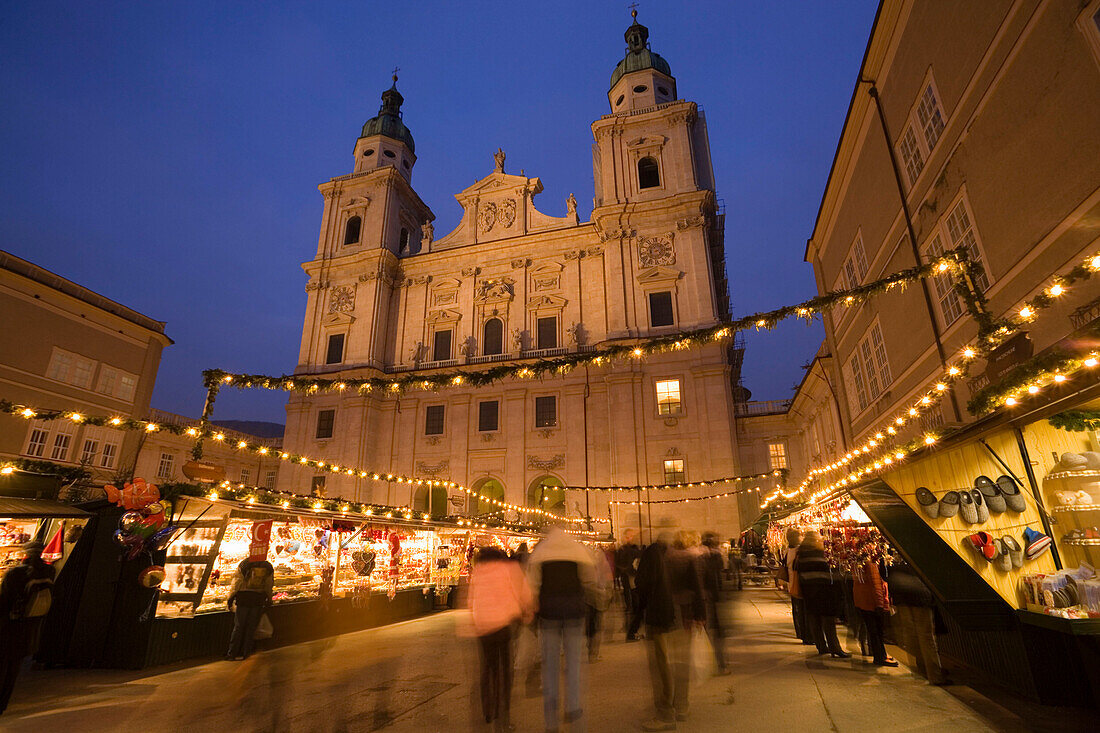 Christmas market at Cathedral Square near Salzburg Cathedral in the evening, Salzburg, Salzburg, Austria