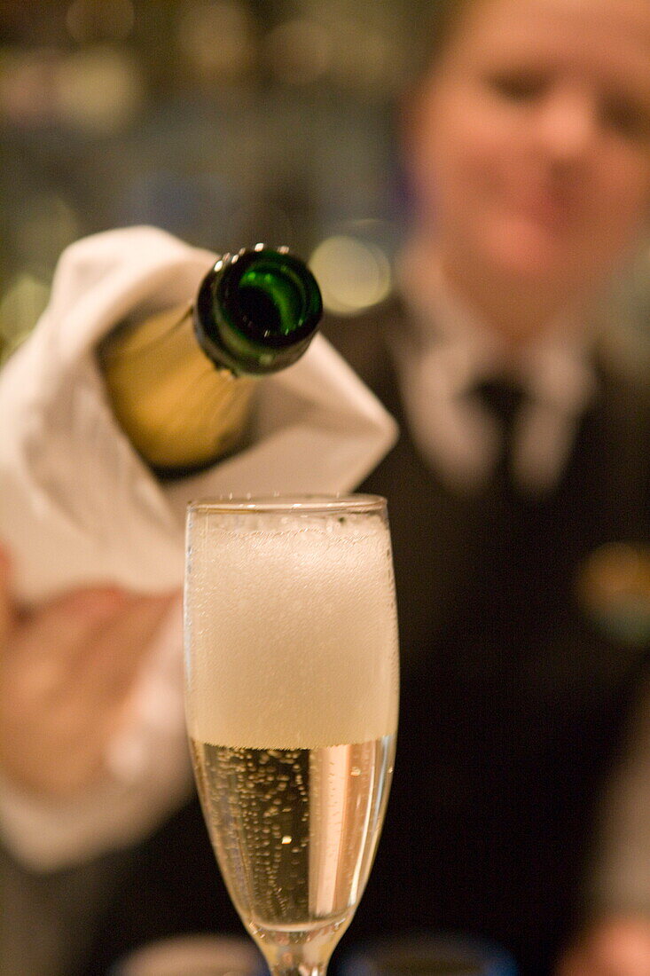 Pouring Welcome Champagne at Champagne Bar,Freedom of the Seas Cruise Ship, Royal Caribbean International Cruise Line