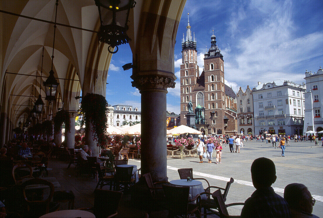 Market Square in Cracow, View from Cloth Hall toward Church of Virgin Mary in Cracow, Poland