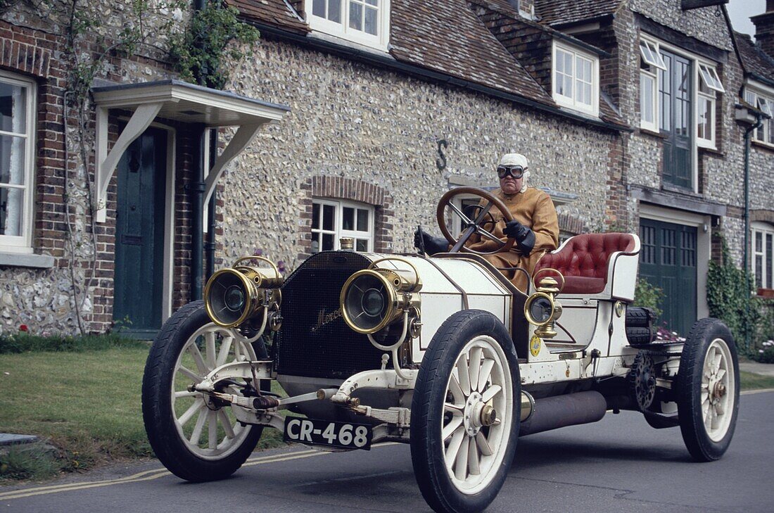 Lord Folkes-Halbart driving in his 1907 Mercedes-Benz near Eastbourne, East Sussex, England