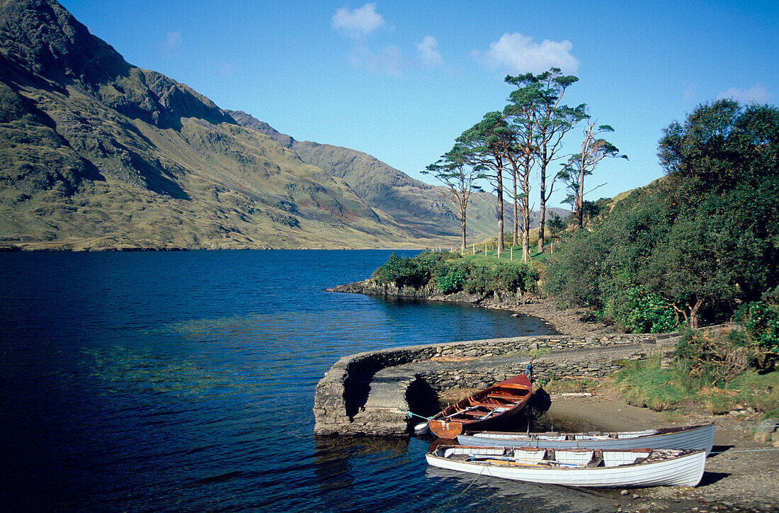Boats at lakeshore, County Mayo, Ireland