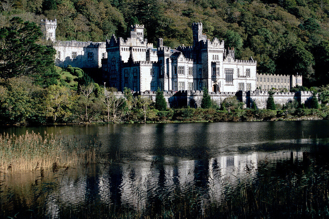 View of Kylemore Abbey with lake, County Galway, Ireland