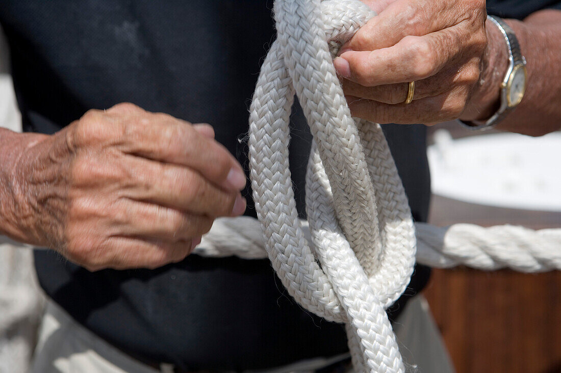 Man tying a Knot, aboard the Star Clipper, Caribbean Sea