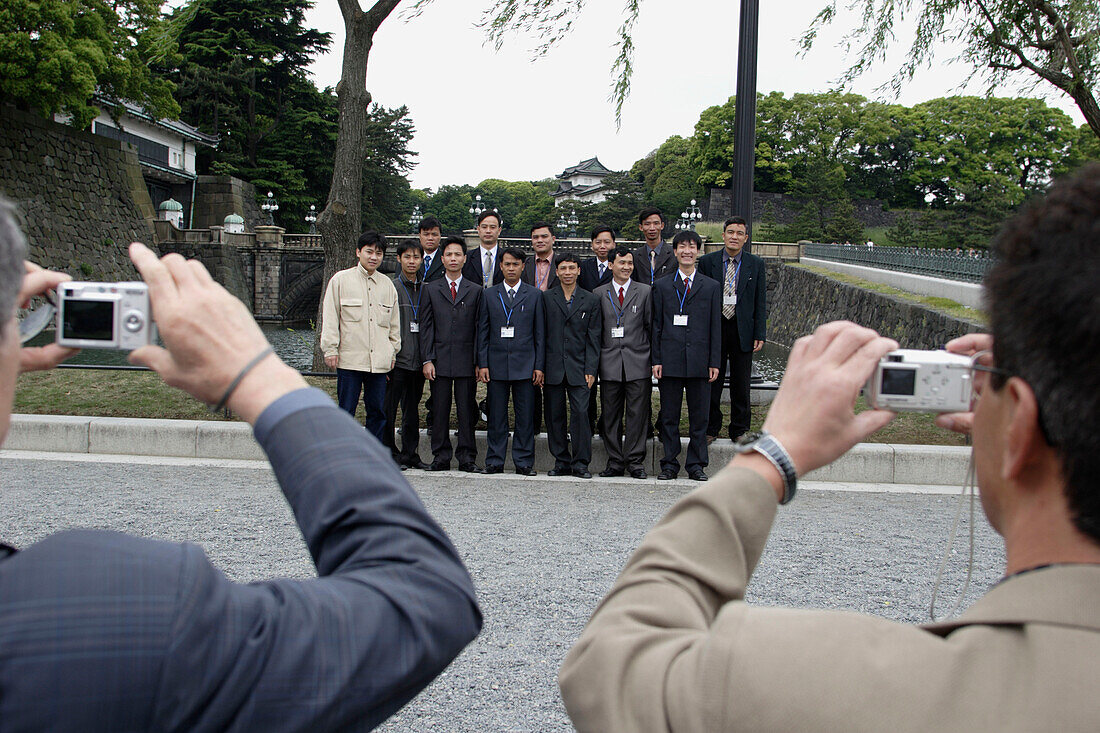 Business people, visitors,  Tourists in front of the Imperial Palace, Marunouchi, Tokyo, Japan