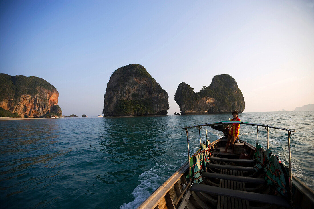 View from a Longtail Boat to Railay West with chalk cliff, Laem Phra Nang, Railay, Krabi, Thailand