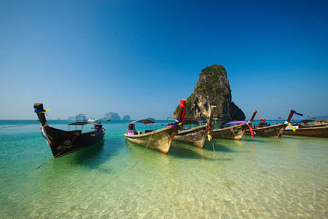 Anchored boats, chalk cliff in background, Phra Nang Beach, Laem Phra Nang, Railay, Krabi, Thailand, after the tsunami