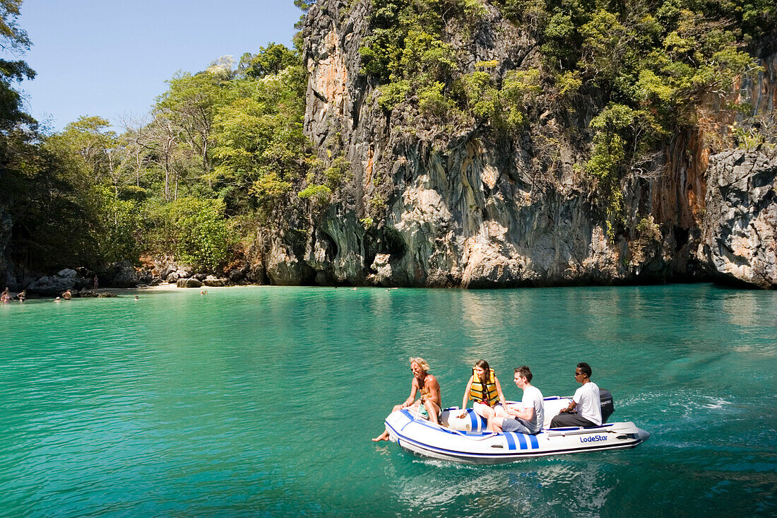 Tourists having a boat trip along Lading Island, Krabi, Thailand, after the tsunami