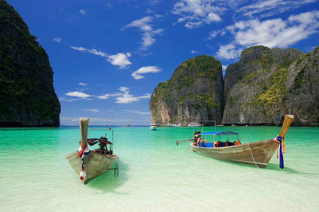 Two boats anchoring in the Maya Bay, a beautiful scenic lagoon, famous for the Hollywood film &quot;The Beach&quot;, Ko Phi-Phi Leh, Ko Phi-Phi Islands, Krabi, Thailand, after the tsunami