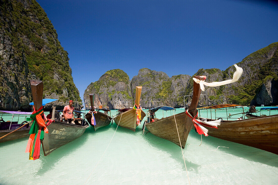 Boats anchoring in the Maya Bay, a beautiful scenic lagoon, famous for the Hollywood film "The Beach", Ko Phi-Phi Leh, Ko Phi-Phi Islands, Krabi, Thailand, after the tsunami