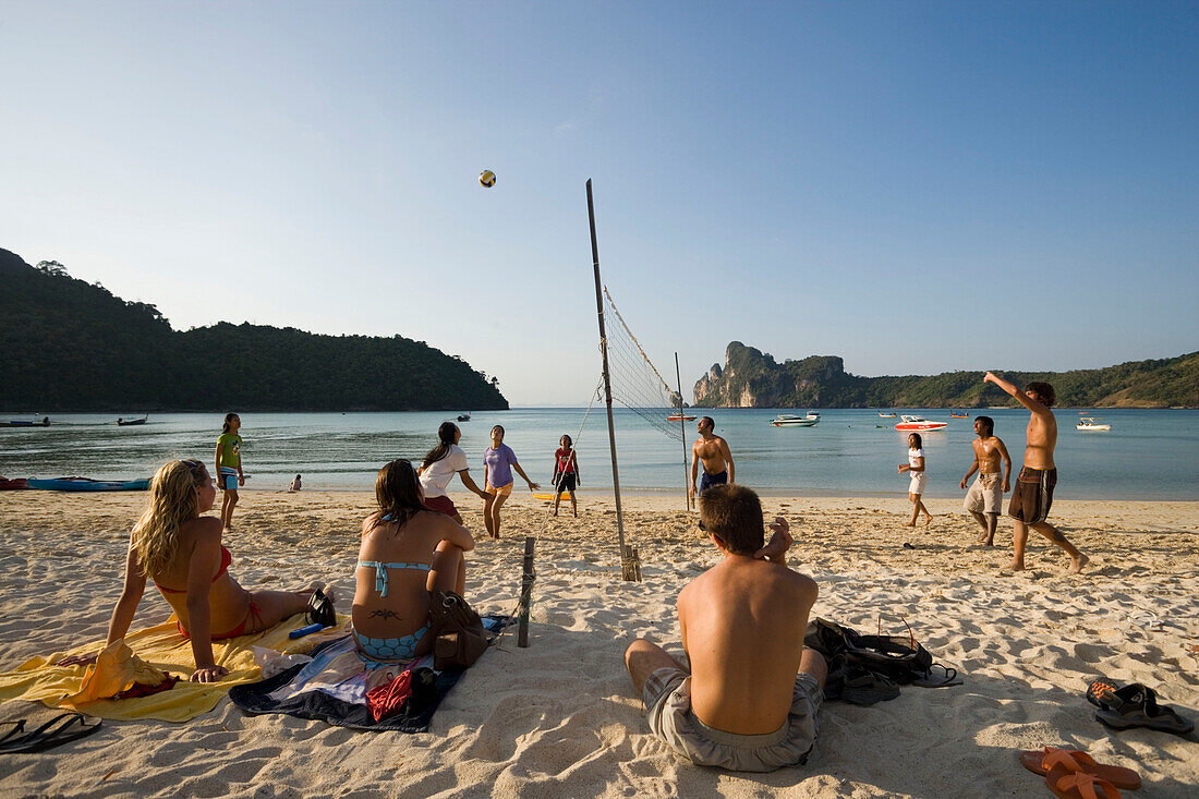 Young people playing beach volleyball, Ao Lo Dalam, Lohdalum Bay, Ko Phi Phi Don, Ko Phi Phi Island, Krabi, Thailand, after the tsunami