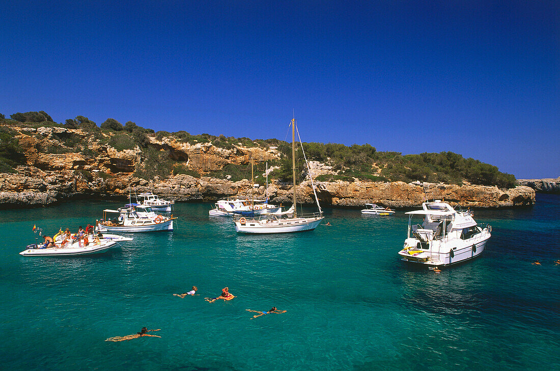 Boats in the bay of Cala de Sanau, near Porto Colom, Mallorca, Spain