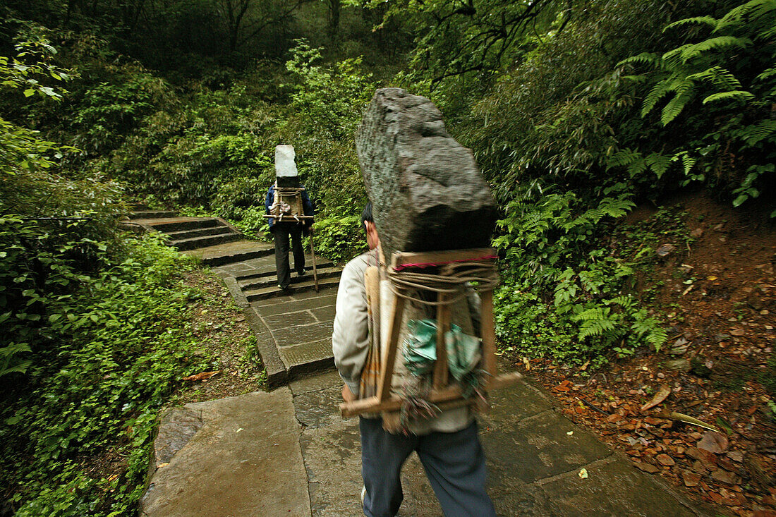 path and stairs, porters with heavy stone load, mountains, Emei Shan, World Heritage Site, UNESCO, China, Asia